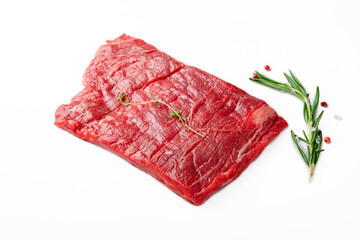 Canvas Print - Raw flank steak or Outside skirt steak isolated on white color by seasonings and herbs