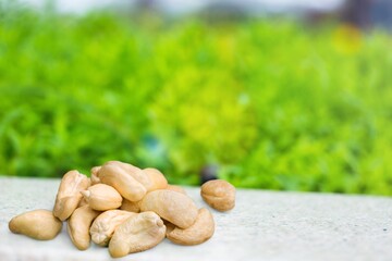 Sticker - Pile of peeled roasted nuts. Package design element