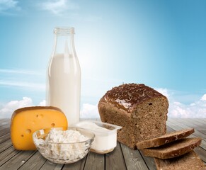 Poster - Jewish holiday Shavuot concept with dairy products on the desk