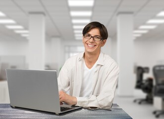 Young man work using computer hand typing laptop keyboard. student study learning education online