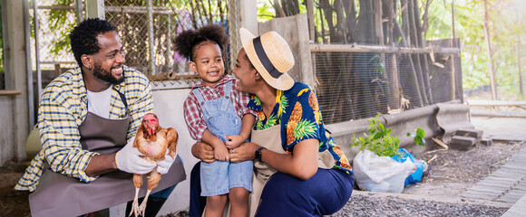 Wall Mural - Portrait of happy sme owner black African American farmer family working in chicken barn farm, worker planting in organic farm, startup small business owner, lifestyle mother father farmer job concept