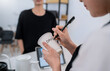 © paulaphoto - Startup successful small business owner sme woman, beauty girl white name on paper cup in coffee shop restaurant. Portrait of asian woman barista cafe owner. SME entrepreneur niche market seller