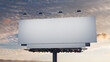© RocknRoller Studios - Commercial Billboard. Empty Exterior Sign against a Sunset Sky. Design Template.