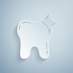 Sticker - Paper cut Tooth whitening concept icon isolated on grey background. Tooth symbol for dentistry clinic or dentist medical center. Paper art style. Vector