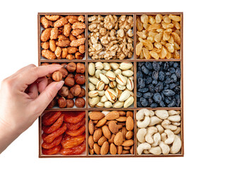 Wall Mural - Hand with assorted nuts and dried fruit collection. Different superfoods. Vegetarian snack of different nuts. organic mixed nuts background
