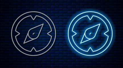 Poster - Glowing neon line Compass icon isolated on brick wall background. Windrose navigation symbol. Wind rose sign. Vector