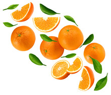 Flying Orange Fruits With Slices And Green Leaves Isolated On White Background. Clipping Path