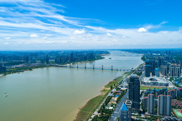 Wall Mural - Aerial photography of urban landscape under blue sky and white clouds, Nanchang, Jiangxi