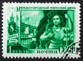 Wall Mural - USSR - CIRCA 1949: stamp printed in the USSR Russia shows a female athlete with inscription International Women's Day March 8, 1949 from the series International Women's Day March 8 , circa 1949