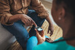 © Dragana Gordic - Young nurse doing a glucose blood test on her senior patient, during a home visit. Theme diabetes. The man whose glucose was measured by going to the home of healthcare professionals.