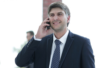 Canvas Print - Serious businessman talking on the phone.