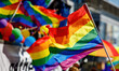 © 9parusnikov - Lgbt pride rainbow flag during parade in the city .