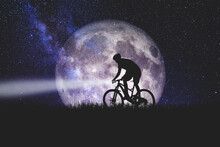 Silhouette Of A Cyclist On A Bicycle