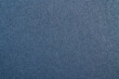 Dark blue tight denim background.Detailed texture of blue denim fabric with high resolution.