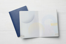 Blank Passports On White Wooden Table, Flat Lay
