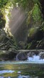 indonesian scenery waterfall in tropical forest with clear flowing water at sunrise