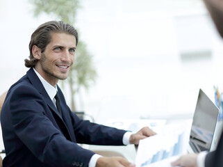 Wall Mural - employee gives the Manager the financial report