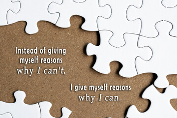 Wall Mural - Motivational quote on white jigsaw with some missing pieces on brown background.