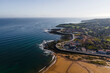 © AmazingAerialAgency - Aerial view of Gijon town along the coast with Playa de San Lorenzo, Asturias, Spain.