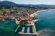 Aerial View Of Boats In The Harbour In Carril, Galicia, Spain.