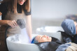 © chokniti - Young woman pampering herself at salon with hair spa, hair cut and hair wash with steam in salon