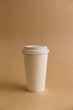 © Виктория Вакулюк - The concept of takeaway coffee, coffee in a paper white glass, the beginning of the day.