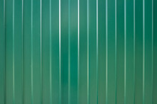 Ribbed Green Steel Roofing And Siding Panel Background.