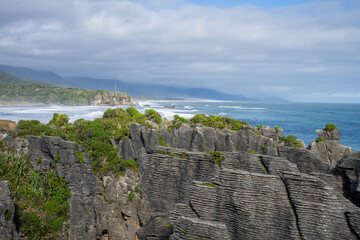 Wall Mural - Stratified layer-like formation of famous pancake rocks at Punakaiki