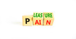© Dzmitry - Pain or pleasure symbol. Concept words Pain or Pleasure on wooden cubes. Beautiful white table white background. Business and pain or pleasure concept. Copy space.