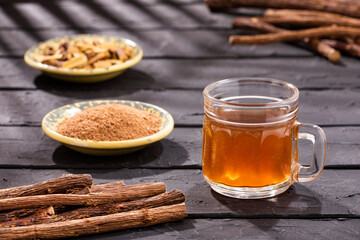 Canvas Print - Glycyrrhiza glabra - Licorice roots with hot drink