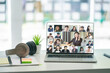 © Kris Tan - Note book computor with diverse colleagues in online briefing with laptop at home. VDO conference call with business partner group.