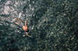 © Connect Images - Boy swimming in lake