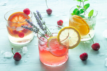 Poster - Fresh summer cocktails or mocktails, cold drinks with citrus fruits and lavender, party lemonade with cherries and lavender