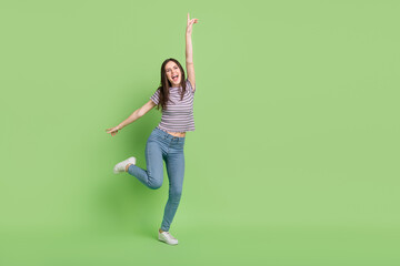 Sticker - Full length body size view of attractive cheery thin lucky cool girl dance music event copy space isolated on bright green color background