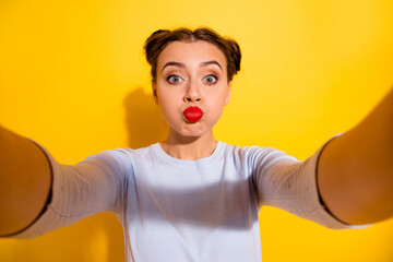 Poster - Photo of dreamy funky lady wear long sleeve recording self video sending you kiss isolated yellow color background