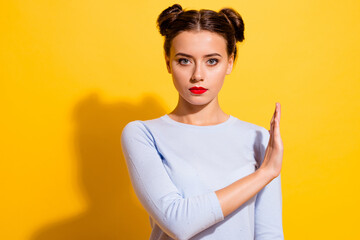 Wall Mural - Photo of strict lady showing stop sign empty space make refusal blocking way isolated bright color background
