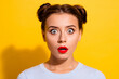 Close-up picture of impressed terrified female hear very bad news can't believe her eyes isolated on yellow color background