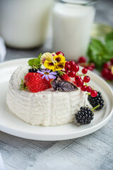 Wall Mural - ..Fresh ricotta with berries and flowers