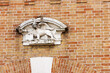 Winged Lion of Saint Mark (Leone di San Marco or Leone Marciano) symbol of the Venetian Republic and the Mark the Evangelist. Medieval tower called Torresin, Oderzo, Treviso province, Veneto, Italy.