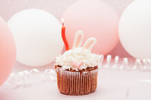 Bunny Cupcake And Red Candle On Glitter Pink Background With Air Balloons, Happy Birthday Card
