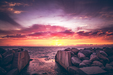 Wall Mural - Sunset over inlet from the Oresund sea into the western harbor area in Malmo, Sweden