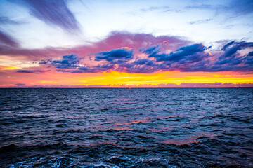 Wall Mural - Outlook over a sunset over the Oresund sea, seen from Malmo, Sweden