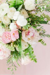 Canvas Print - Selective shot of a composition of white and pink roses and green branches on a light background