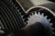 Closeup shot of greasy and oily gears for an industrial crane mechanism