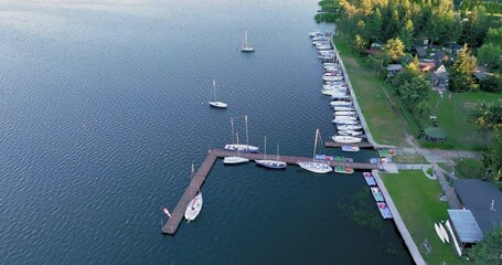 Poster - Aerial view of Boats moored to the shore, marina. Drone View of yachts on the lake. The concept of sailing yachts, boats on the lake, sea.