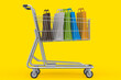 © Vasyl Onyskiv - Shopping cart or trolley with shopping bag on yellow background.