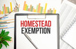 homestead exemption words on file folder and charts