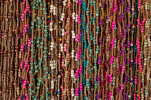 Necklaces Made With Colored Seeds And Natural Fibers