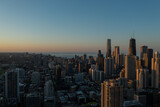 Fototapeta  - Aerial, drone view of Chicago downtown skyline and Lake Michigan during sunset 