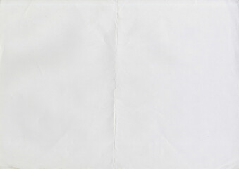 high resolution large image of white paper texture background scan folded in half, soft fine grain u
